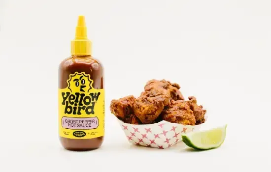 Super Chix Ghost Pepper Nuggets Super chix ghost pepper nuggets with yellowbird classic ghost pepper hot sauce.