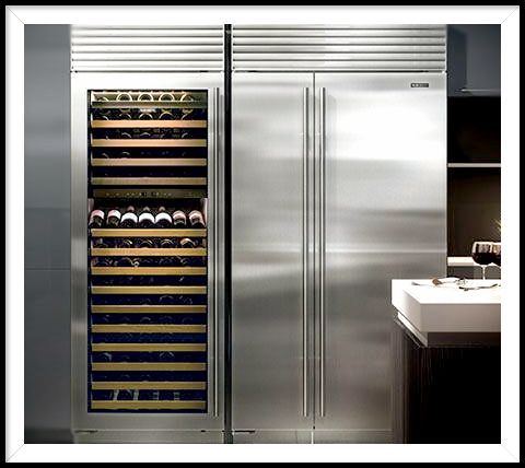 A stainless steel refrigerator with a wine cooler inside of it