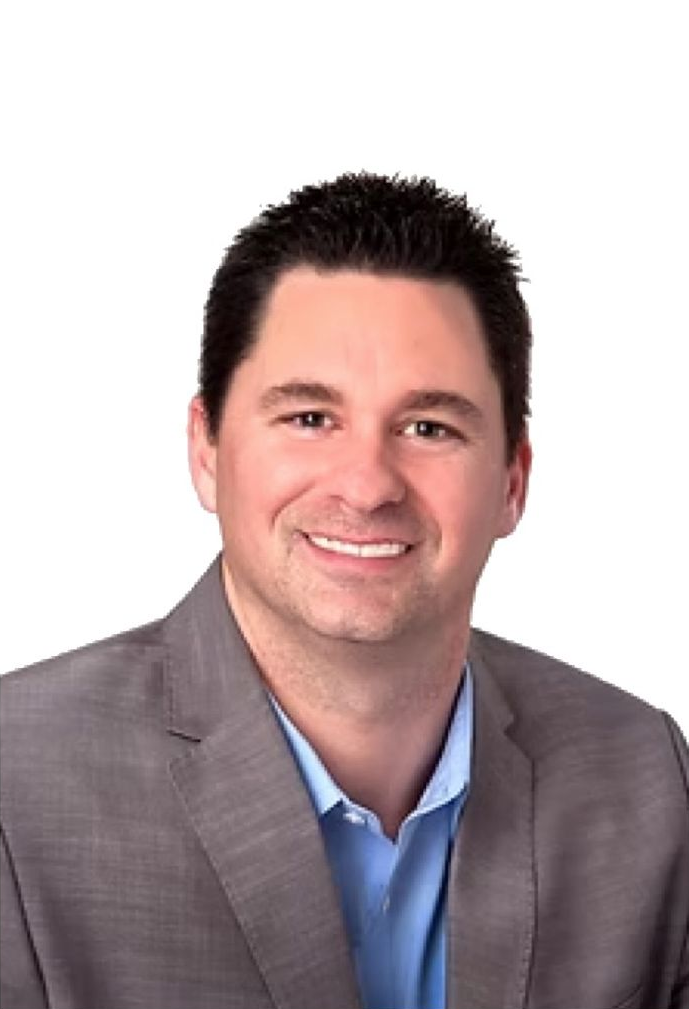 Meet Jason Chastain, Springfield MO's top independent insurance agent Man in gray blazer, blue shirt, smiling against a white background.