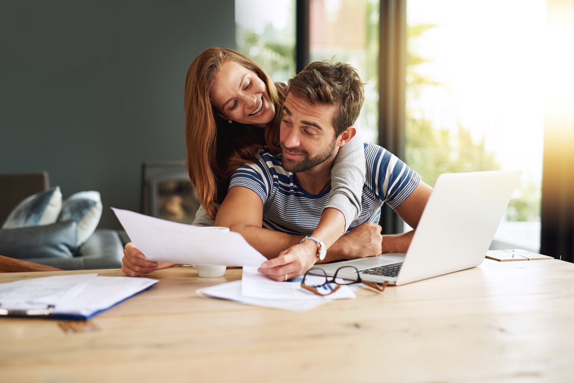 Couple reviewing renters insurance coverage together at home