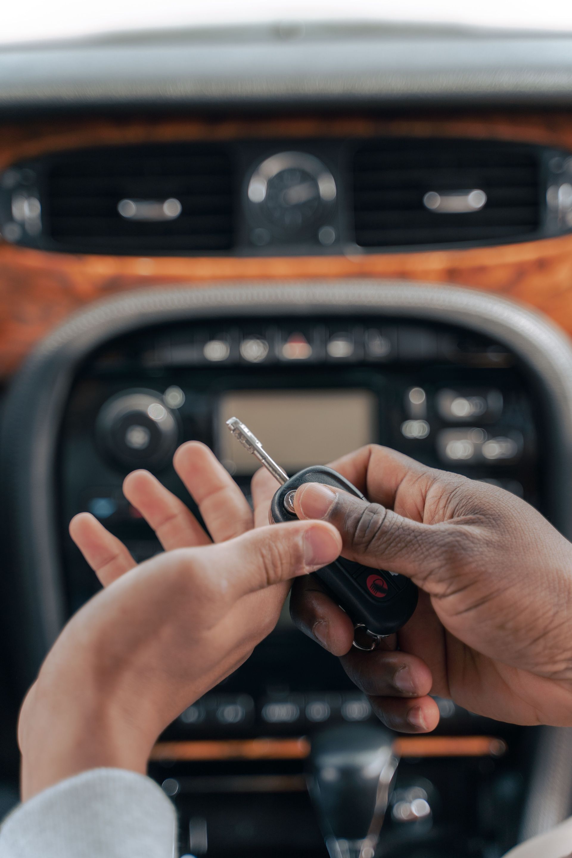 Handing over key inside car in Springfield, MO