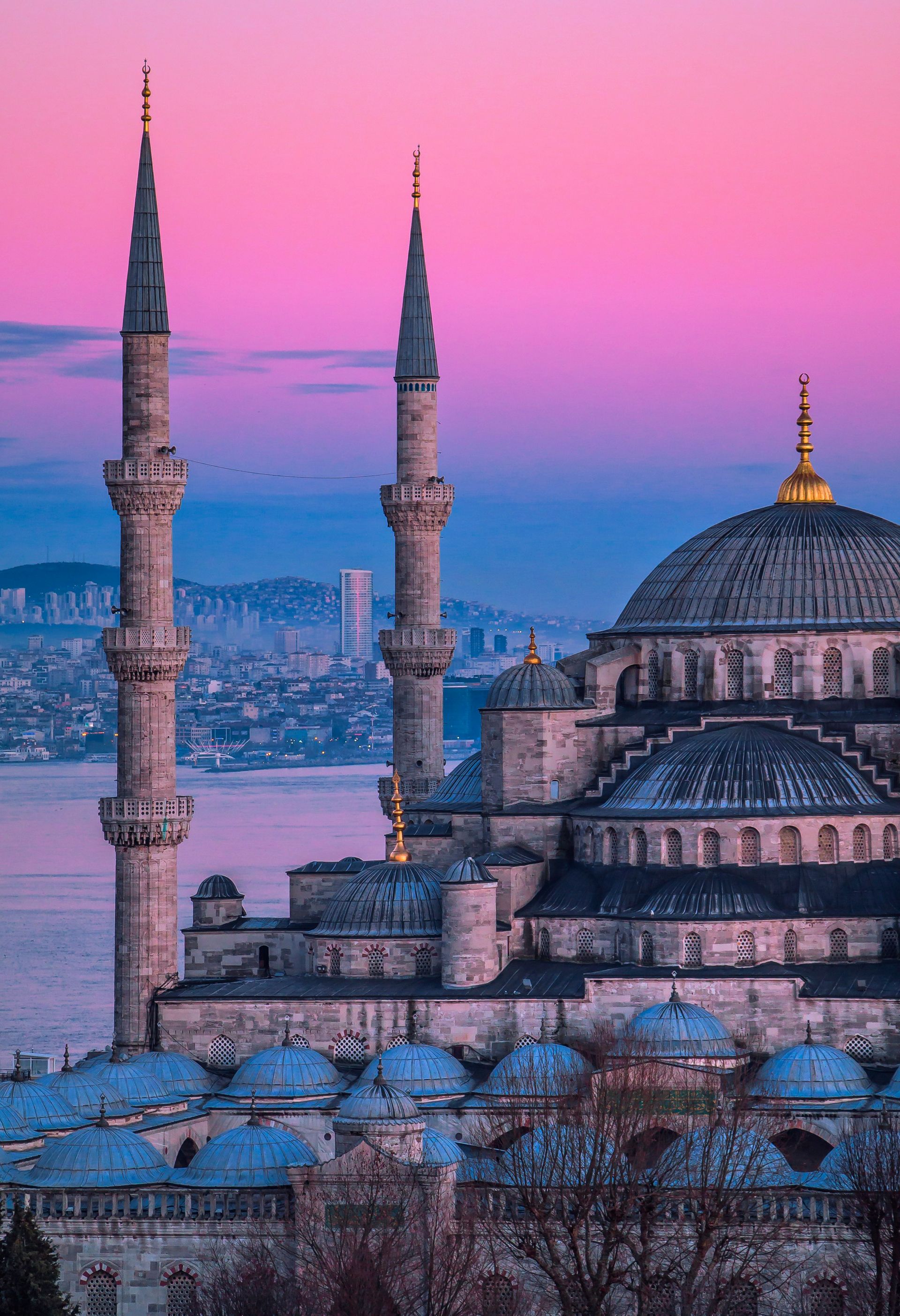 Domes and minarets of Blue Mosque in Istanbul, Turkey during a sunset