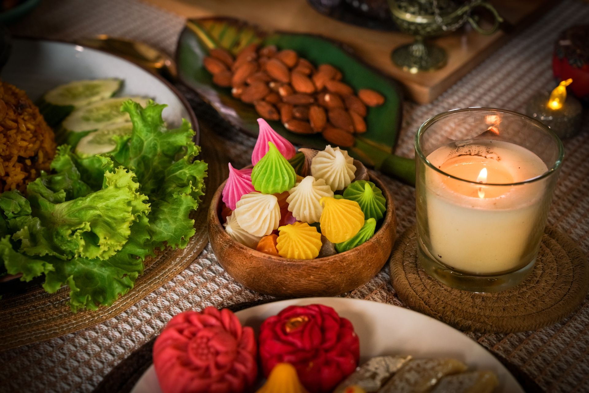 Thai Alua candy and a scented candle on a table, representing all inclusive halal holidays