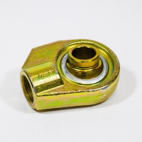Yellow metal spherical rod end bearing on a white background