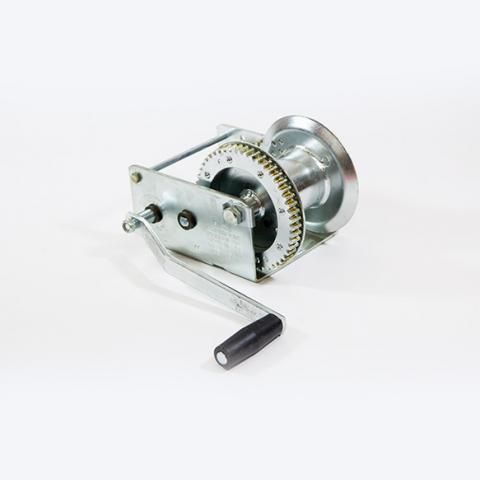 Manual hand-crank winch with metal gears and black handle on a white background