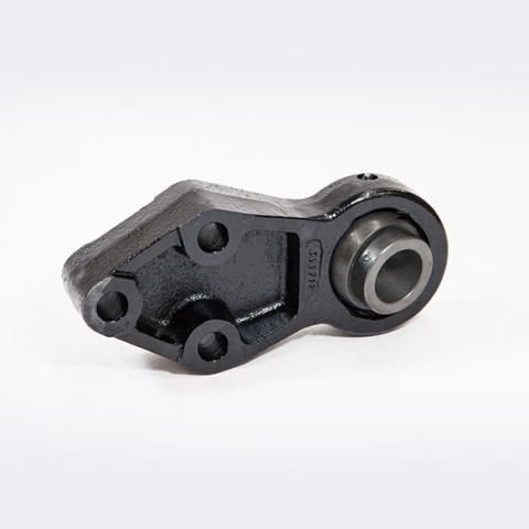 Black metal mechanical bracket with a circular bearing on a white background