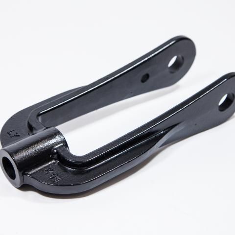 Black metal bicycle fork or bracket with two flat arms on a white background