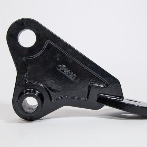 Black metal mechanical lever with circular holes, shown on a white background.