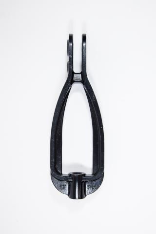 Black hairpin clip with a silver spring on a white background