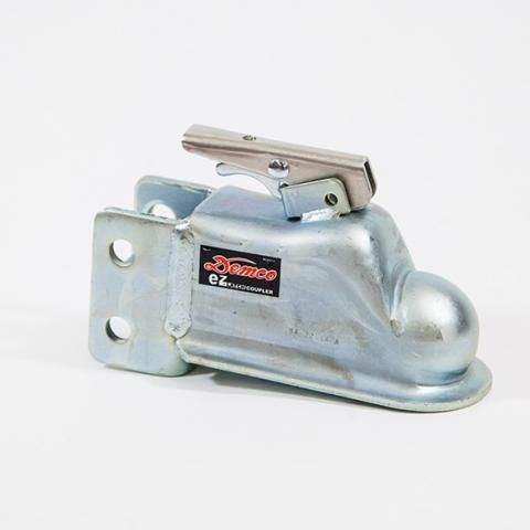 Silver trailer hitch coupler with a metal latch on a white background