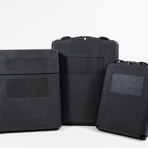 Three black document holders
