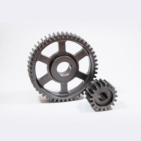 Two metal gears, one large and one small, on a white background.