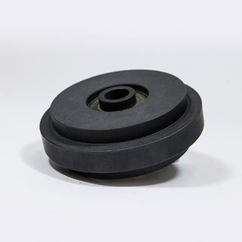 Black rubber wheel or pulley on a white background
