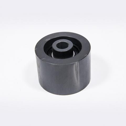 Black cylindrical metal roller or pulley on a white background