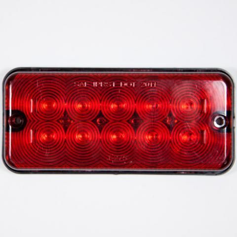 Red rectangular LED tail light with black frame on a white background