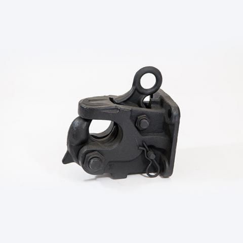Black mechanical metal latch or clamp component on a white background