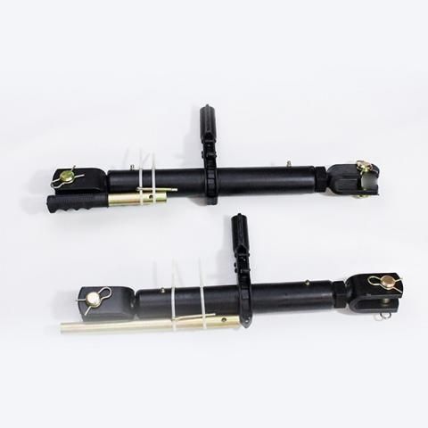 Two black metal rod assemblies with brackets and rubber bushings on a white background
