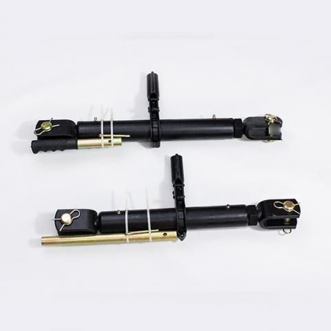 Two black mechanical clamp tools with silver rods, laid horizontally on a white background.