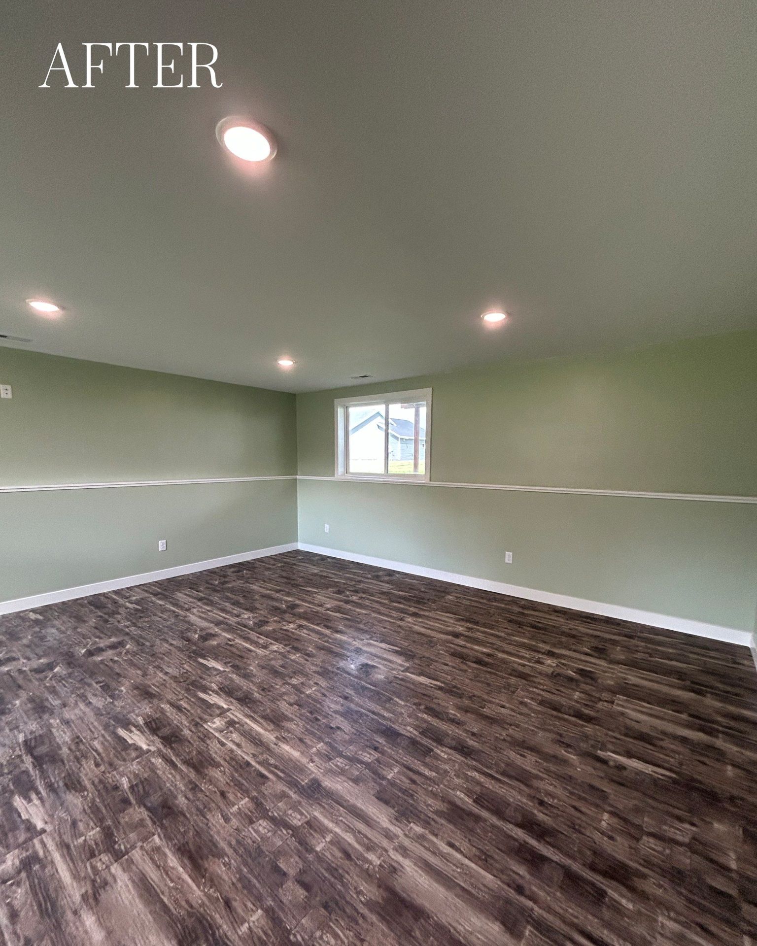 Renovated interior: green walls, white trim, wood-look floor, recessed lighting. 