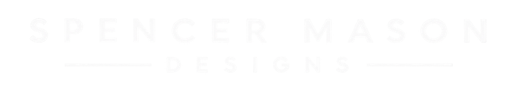 Faint white text reading “SPENCE & MASON” on a pale background.