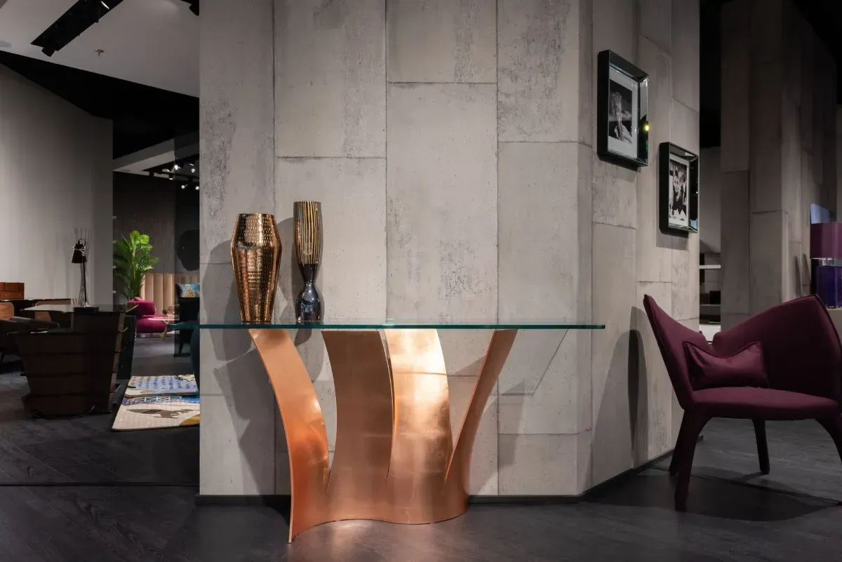 Live-edge wood coffee table with turquoise resin inlay and black metal legs indoors