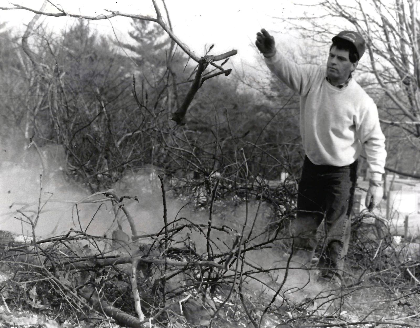Man Throw Branch — Plymouth, MA — Lawrence Landscaping And Sons Man Throw Branch — Plymouth, MA — Lawrence Landscaping And Sons