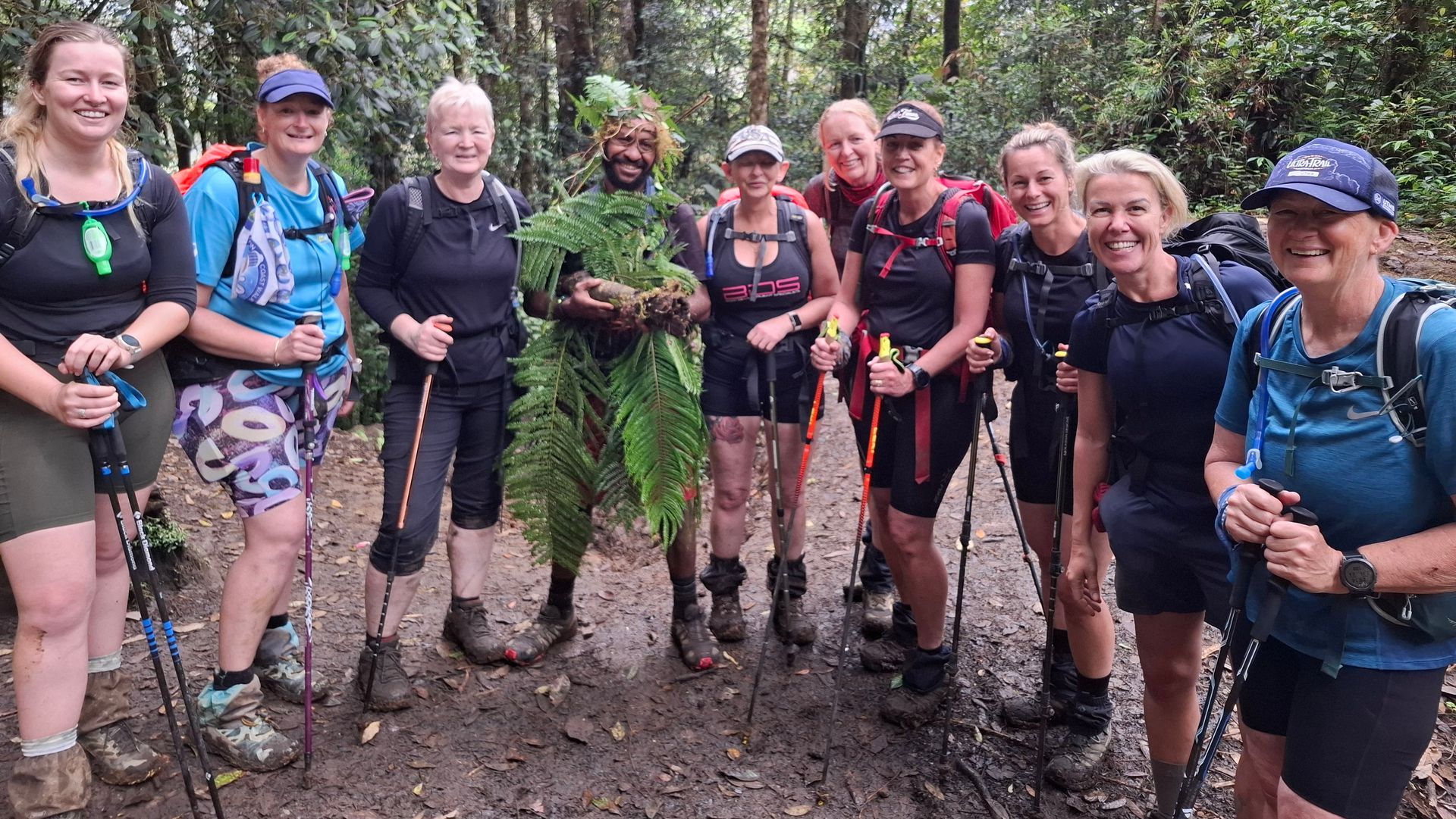 A group of trekkers on the Kokoda trail  in Papua New Guinea downhill on bush track
