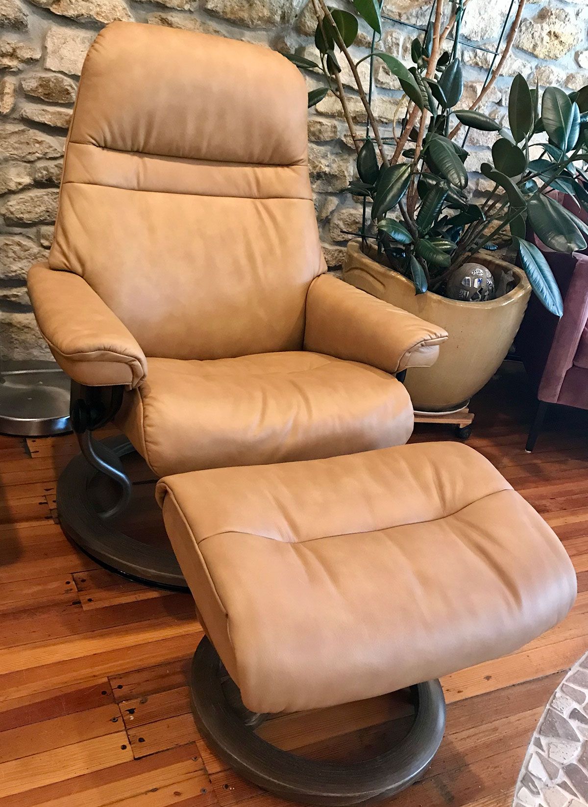 Beautiful tan Ekornes leather recliner for sale at Eagles' Rest Natural Mattresses and Furniture inLawrence, Kansas.