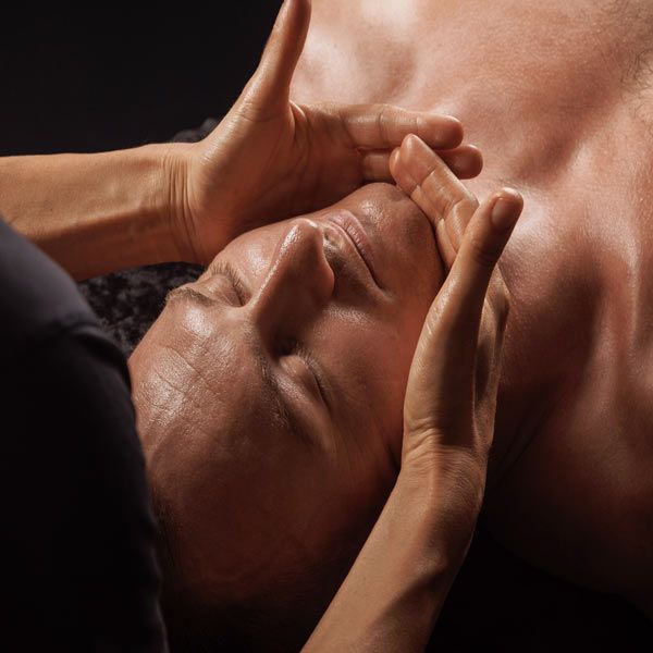 Close up of a man getting a relaxation massage