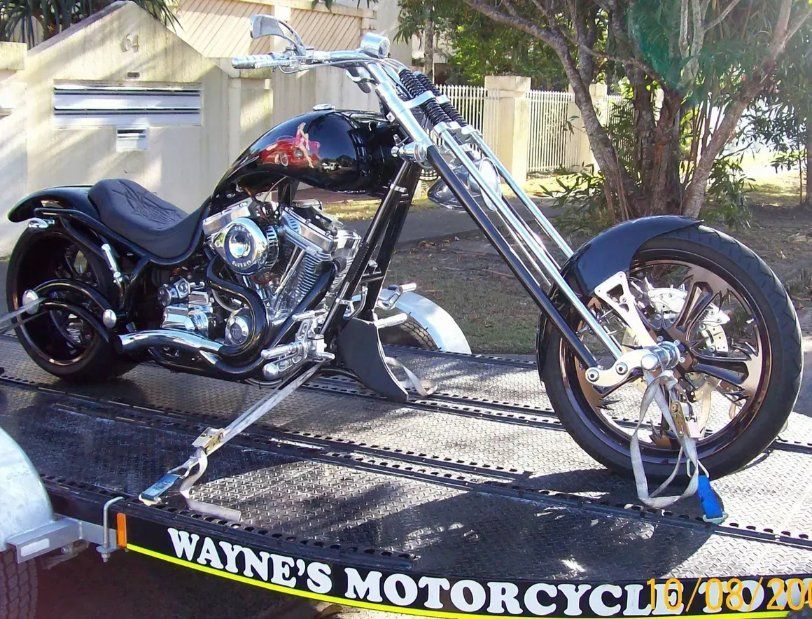 A Motorcycle Is Being Towed By Wayne's Motorcycle Tow — Motorcycle Transporters In Manunda, QLD