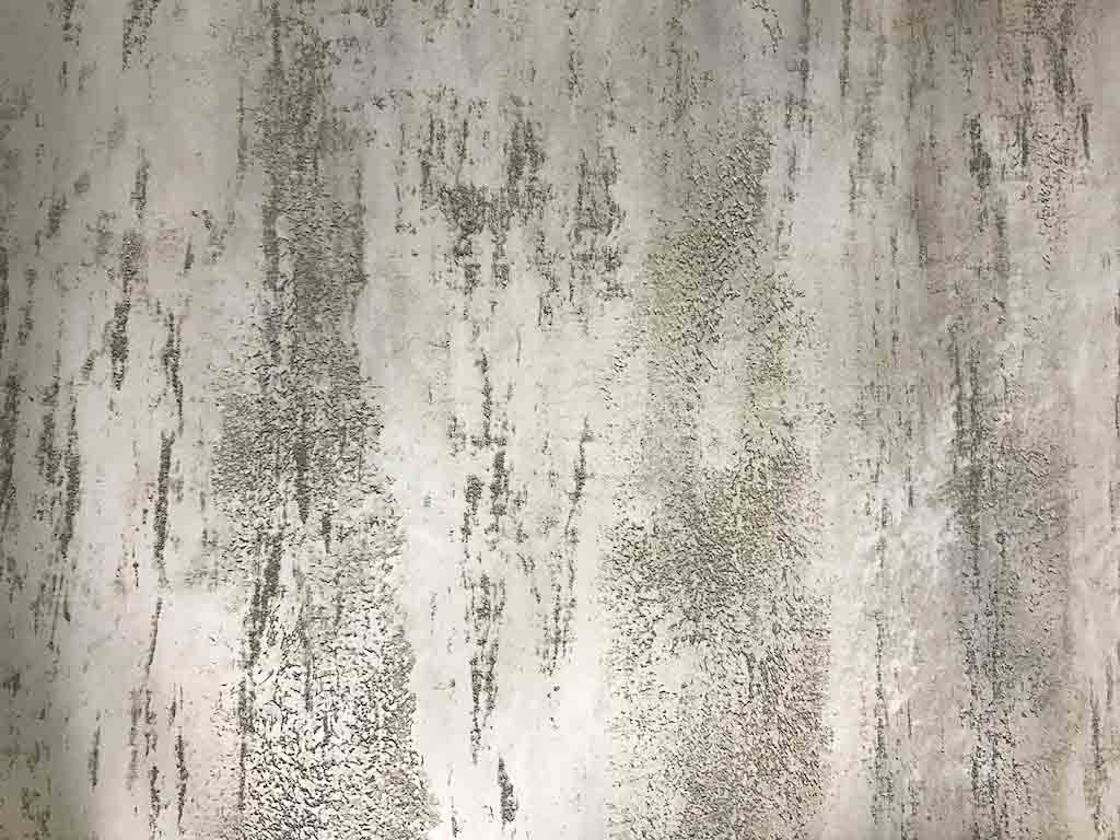 venezia stucco image of a detail of white and silver travertino