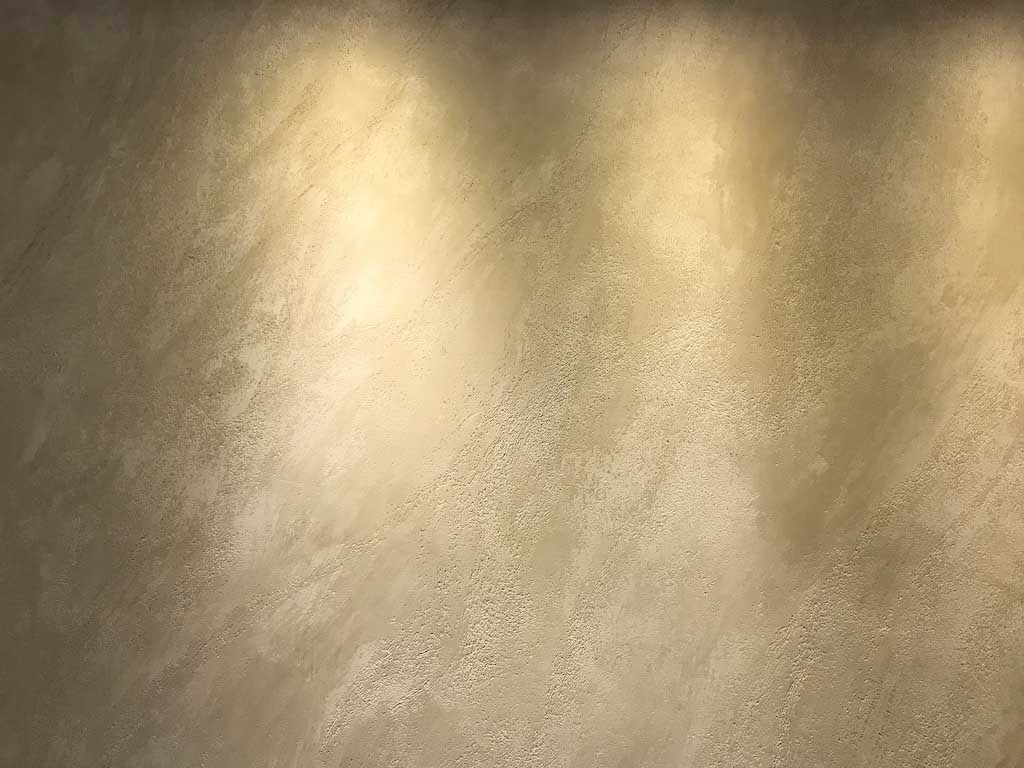 venezia stucco image of a detail of gold travertino wall