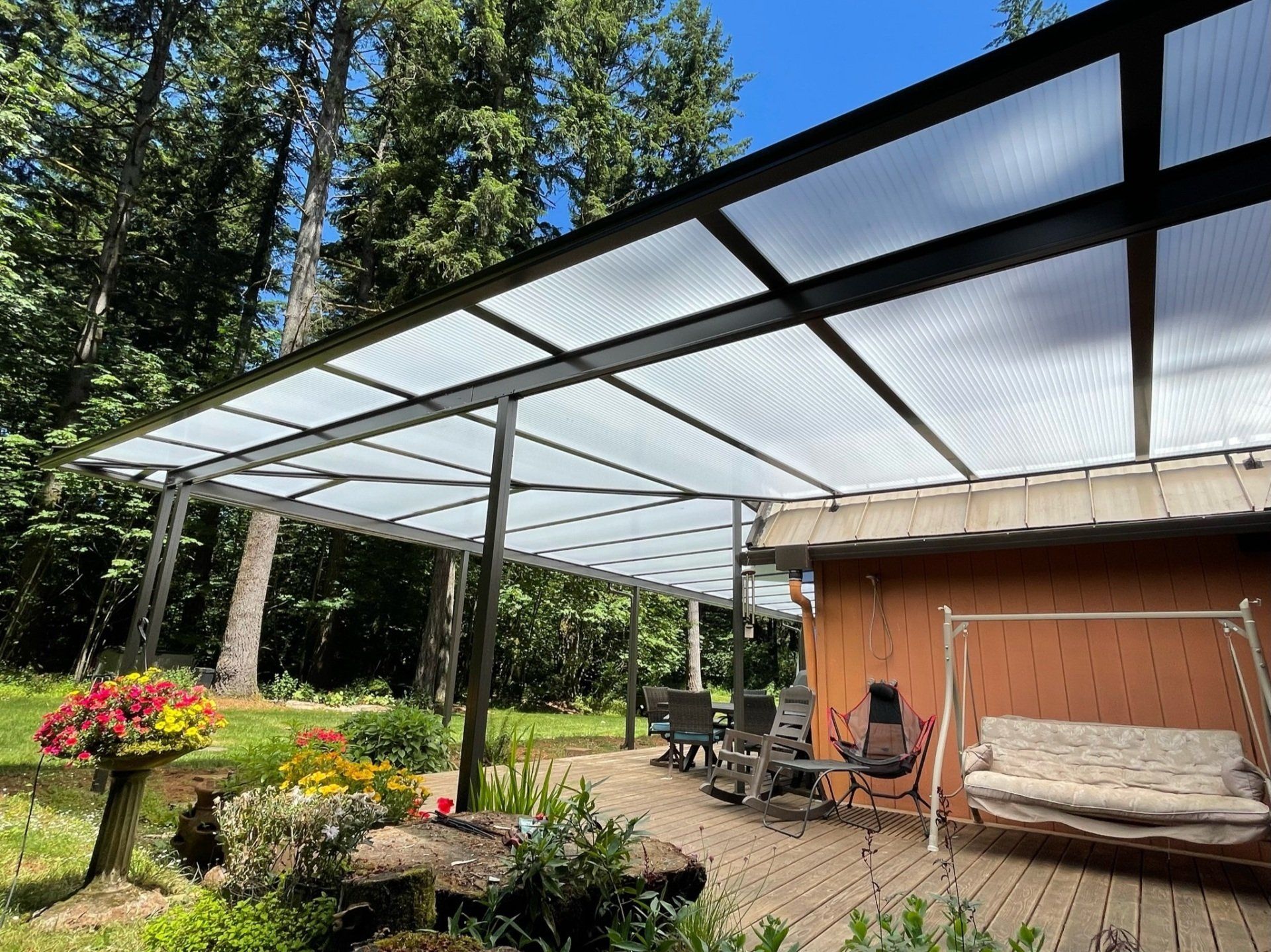 Patio Cover in Portland with Black Shed Style Frame  Acylite Acrylic Roof - Installed By Crown Patio Covers - Local Contractor