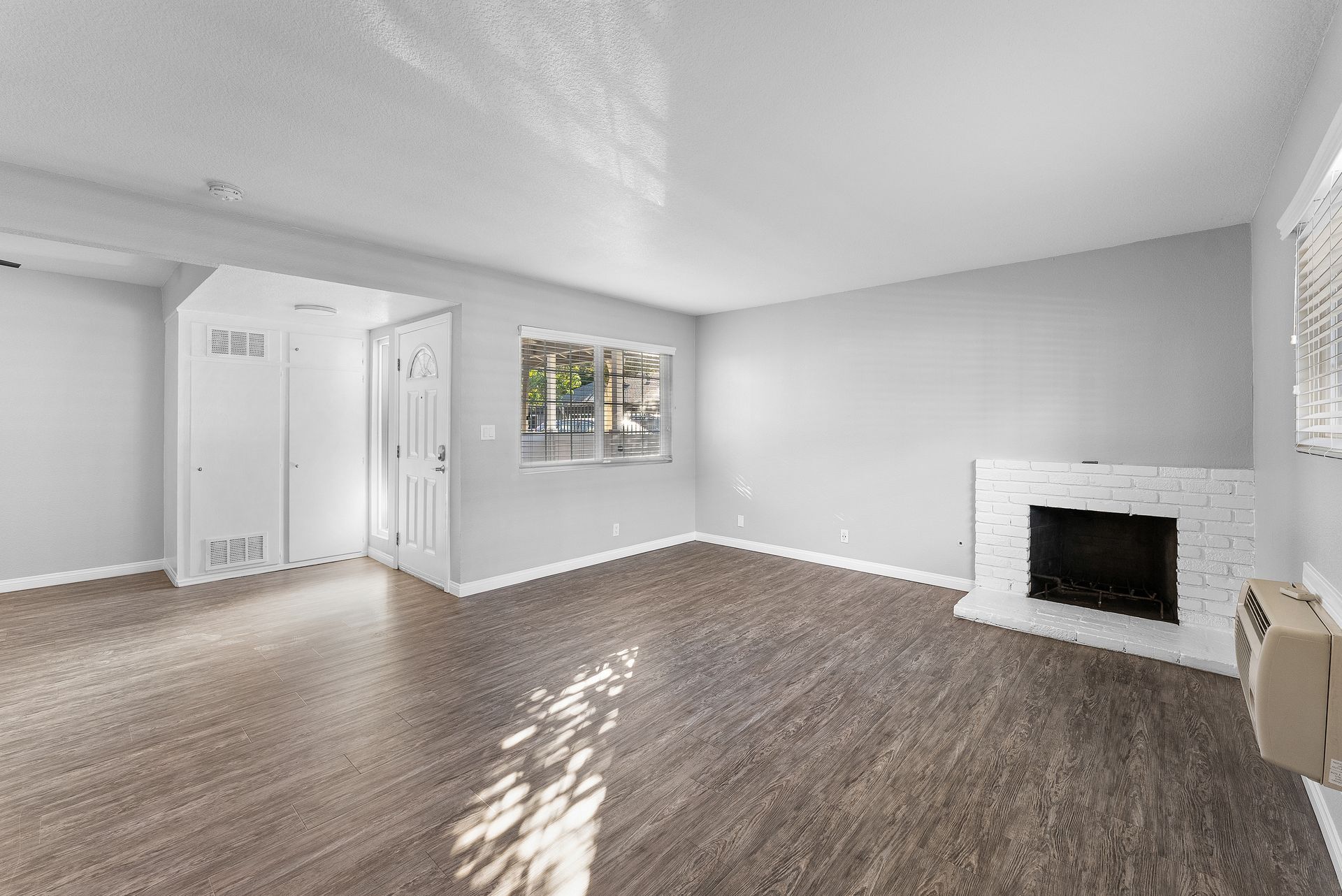 Sliding Photo Gallery Displaying Apartment Features- Living Room