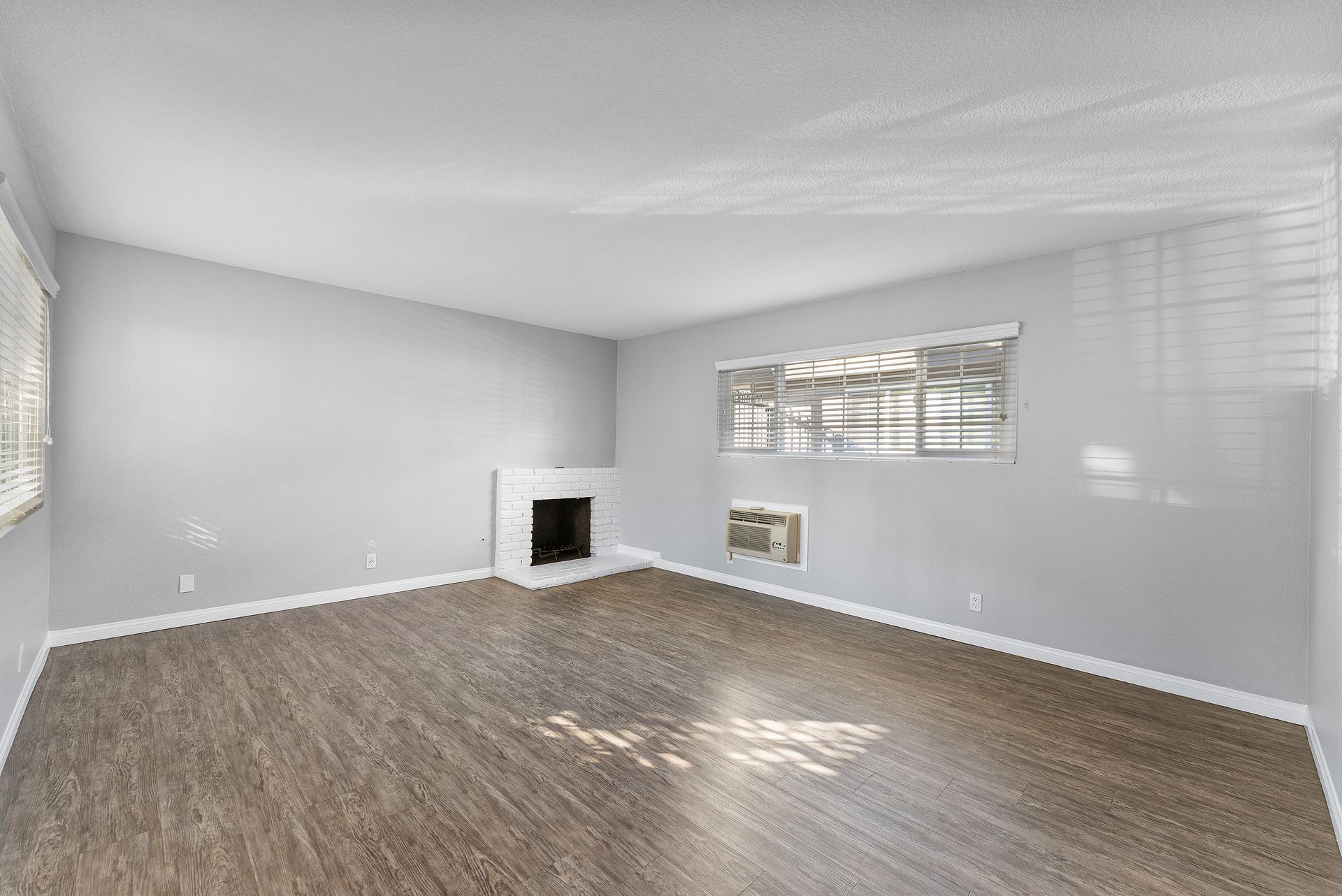 Sliding Photo Gallery Displaying Apartment Features- Fire Place