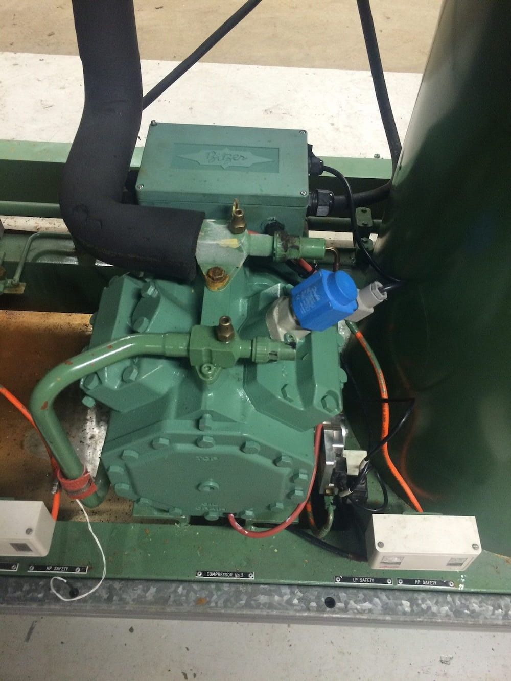A Green Compressor With A Blue Cap On It — Mackies In Taree, NSW