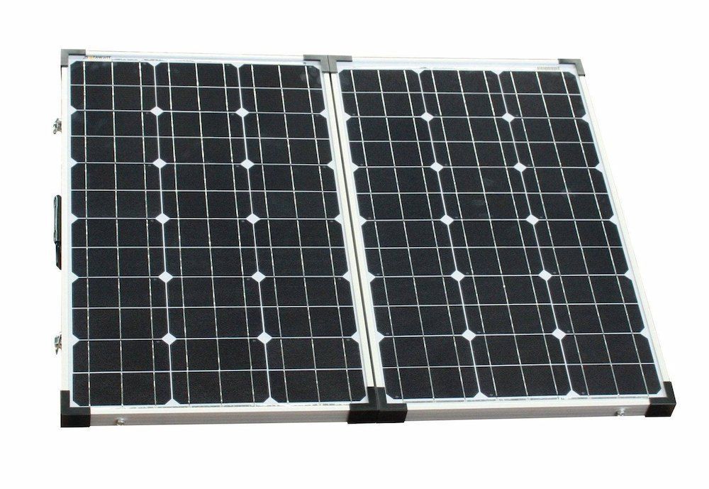 Two Solar Panels Are Stacked On Top Of Each Other On A White Background — Mackies In Taree, NSW