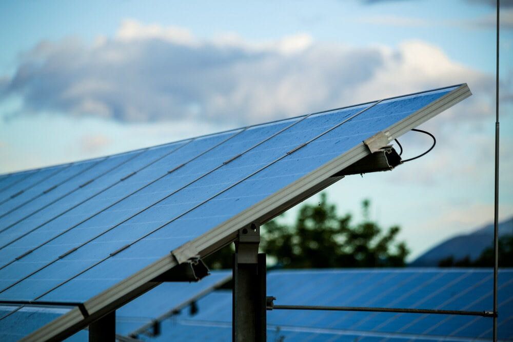 A Close Up Of A Solar Panel With A Cloudy Sky In The Background — Mackies In Taree, NSW