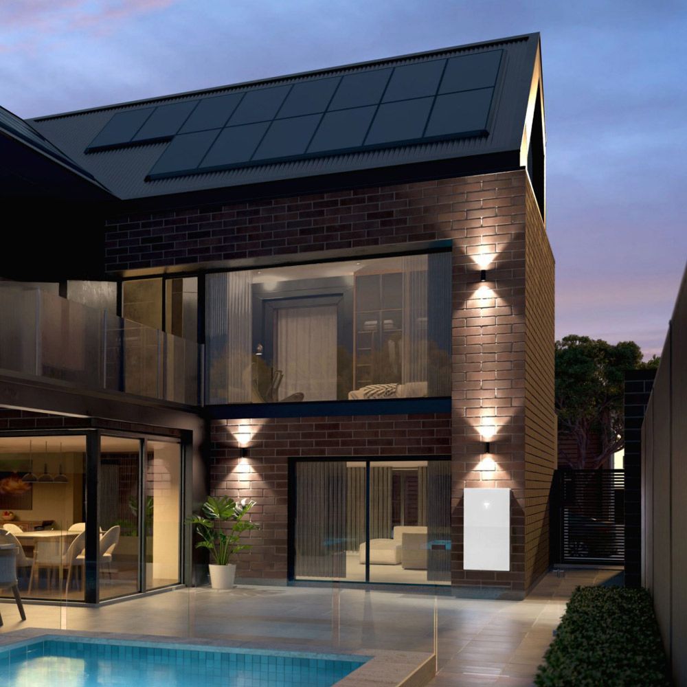 Modern Brick House With Solar Panels On The Roof, Pool, And White Battery On The Exterior Wall — Mackies in Taree, NSW