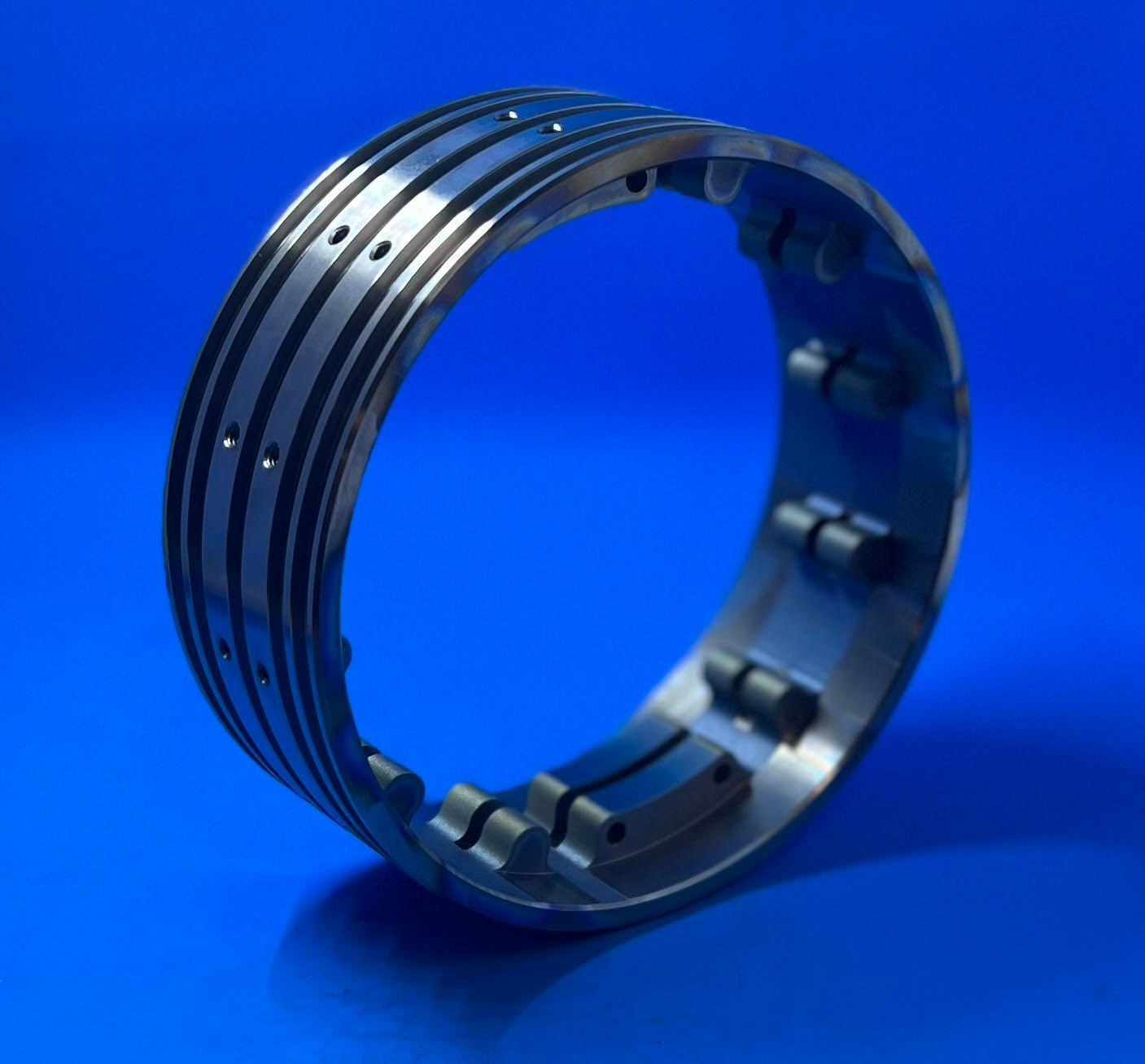 A metal ring is sitting on a blue surface
