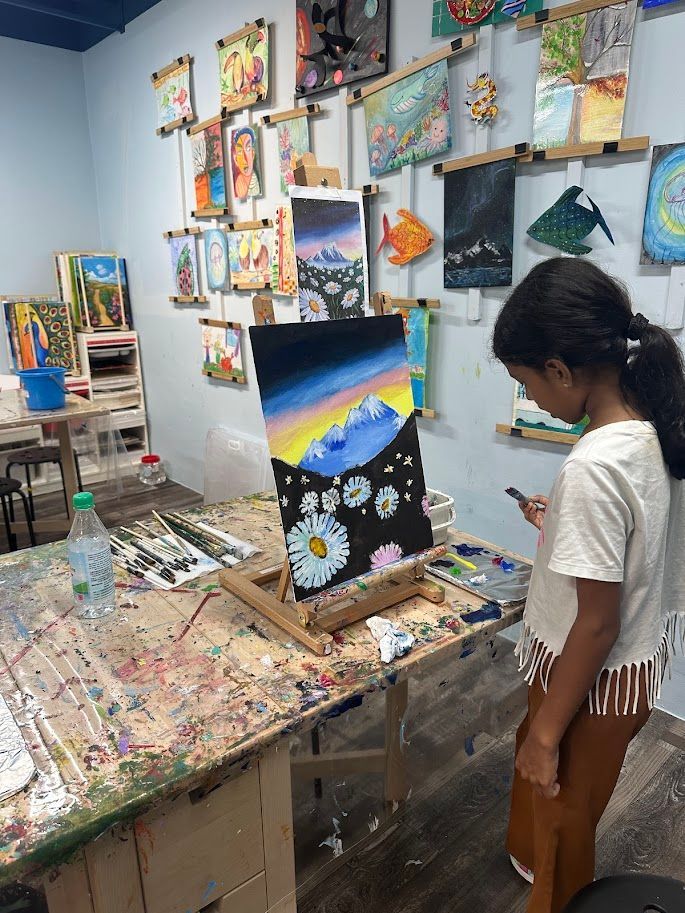 Primary school kid painting