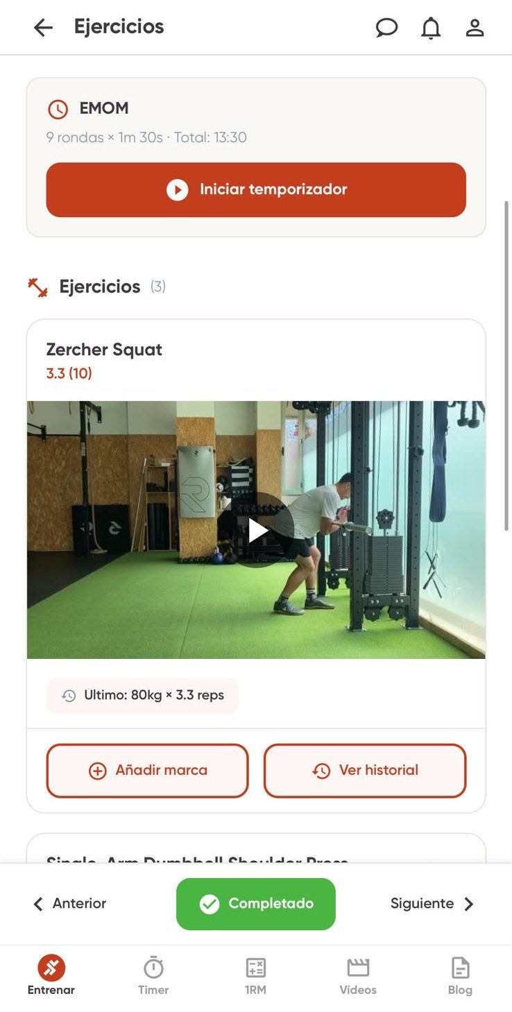 metapp: bloque EMOM con botón Iniciar temporizador, Zercher Squat con vídeo y registro de marcas