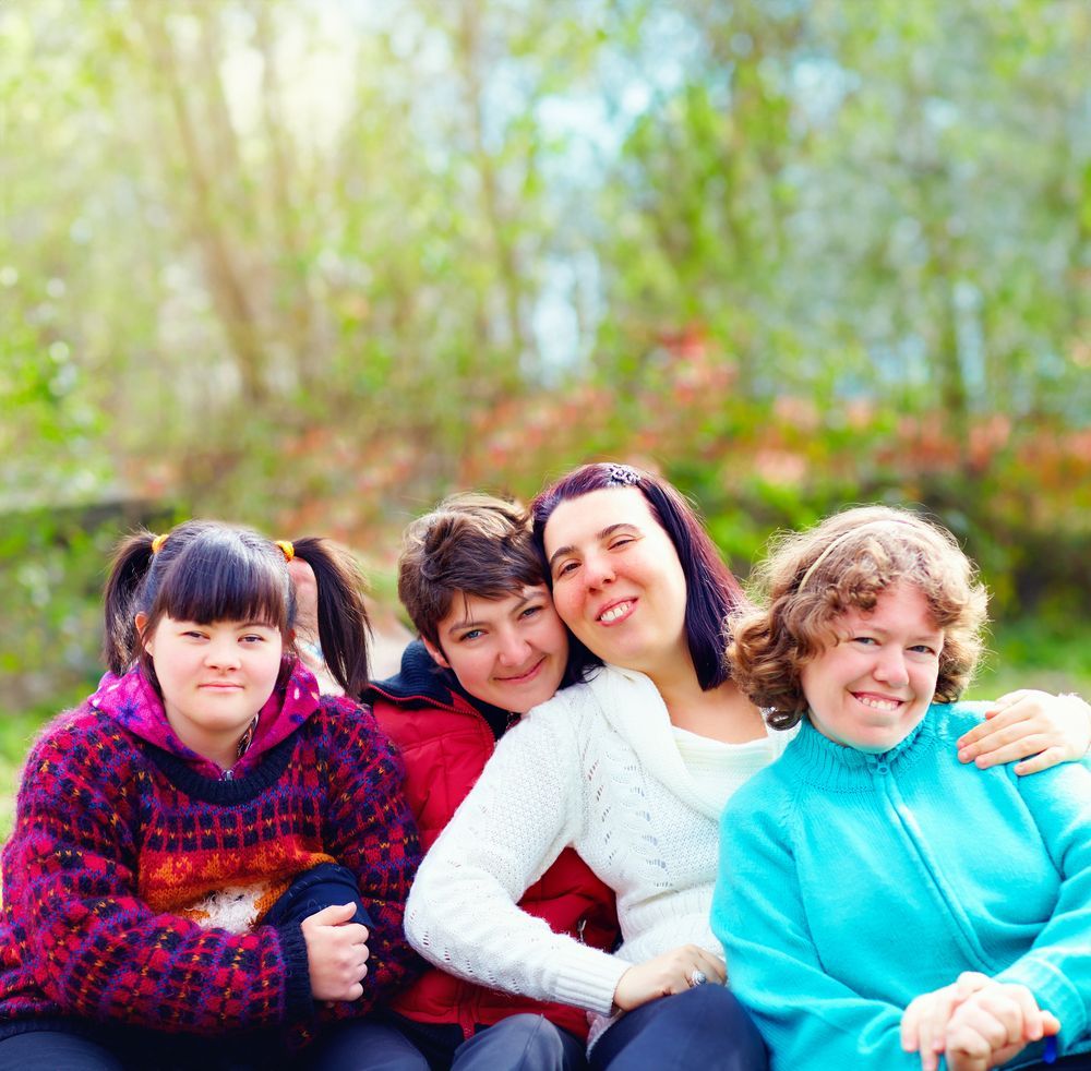 A Group Of Women Are Posing For A Picture Together — Coast 2 Coast Disability Support Services in Taree, NSW