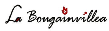 Stylized “La Bougainvillea” logo in dark script with a small red flower accent on a white background