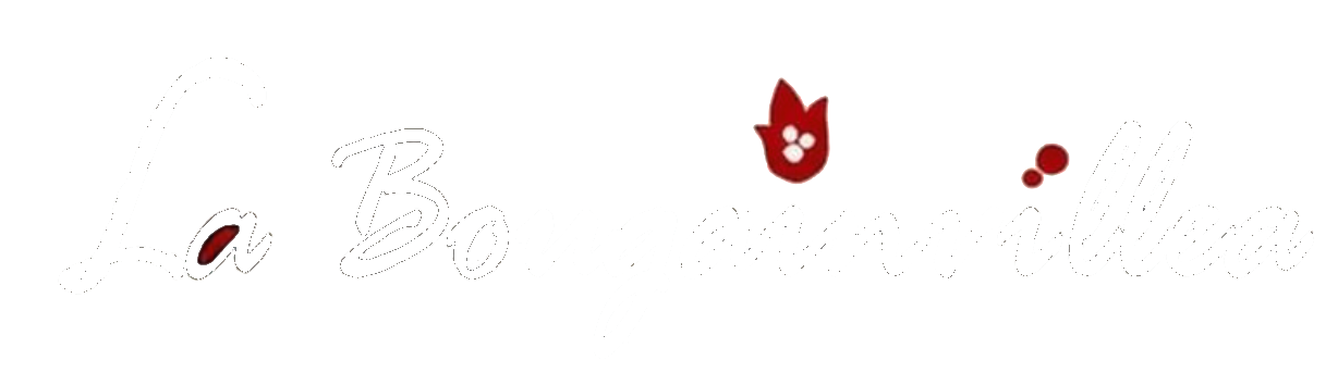 Stylized gray script logo reading “La Bougainvillea” with a small red flower accent