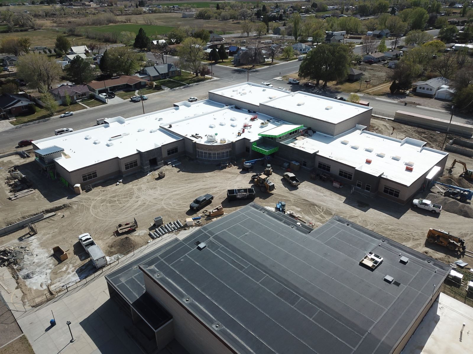 An aerial view of a large building under construction.