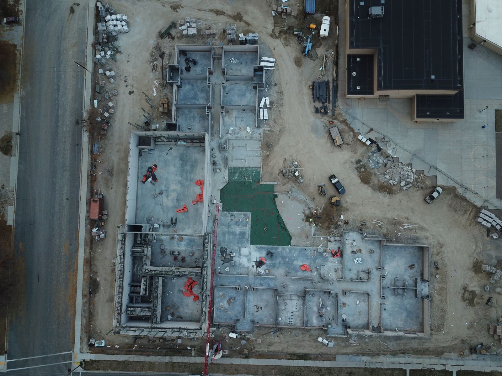 An aerial view of a large building under construction