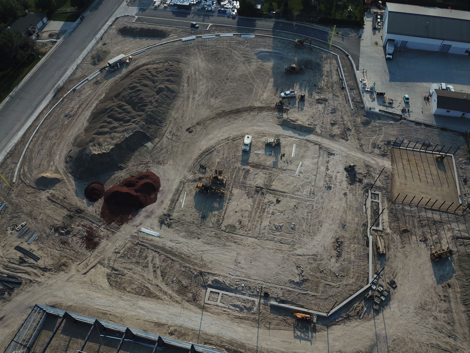 An aerial view of a construction site with a lot of dirt