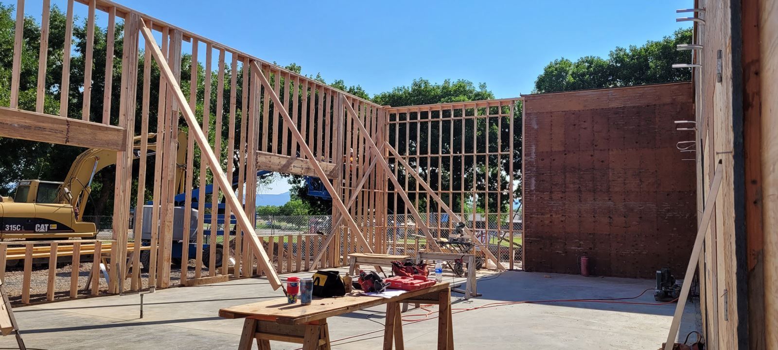 A building is being built with a lot of wooden beams.
