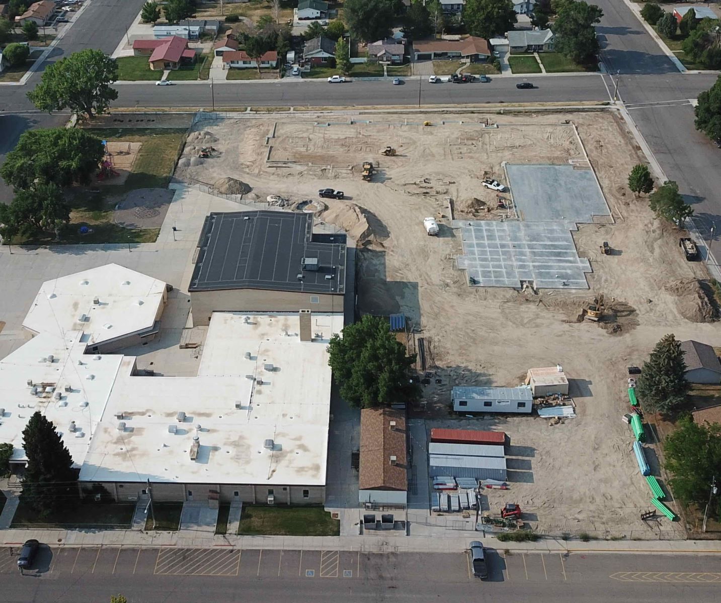 An aerial view of a residential area with a lot of buildings